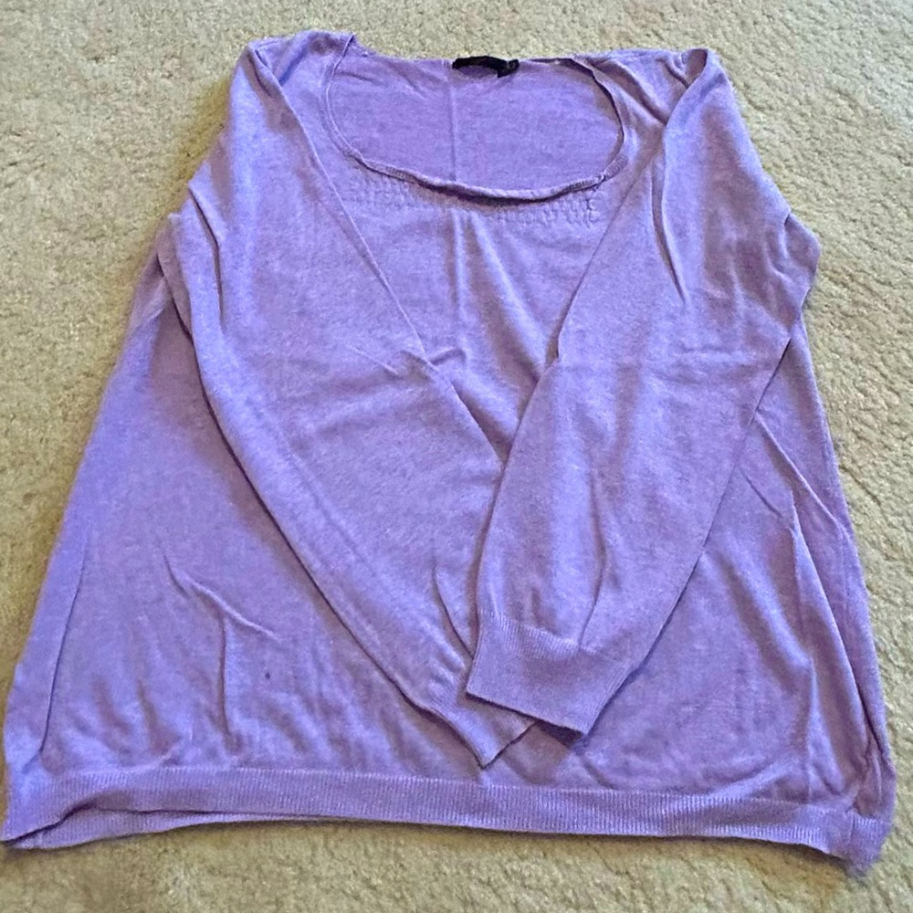 Purple sweater with design by collar